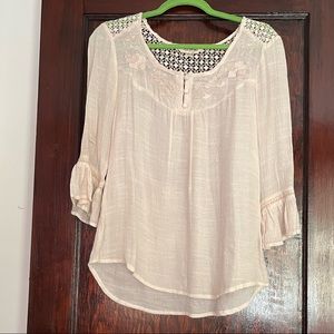 Cream-colored blouse; very light Sz S.